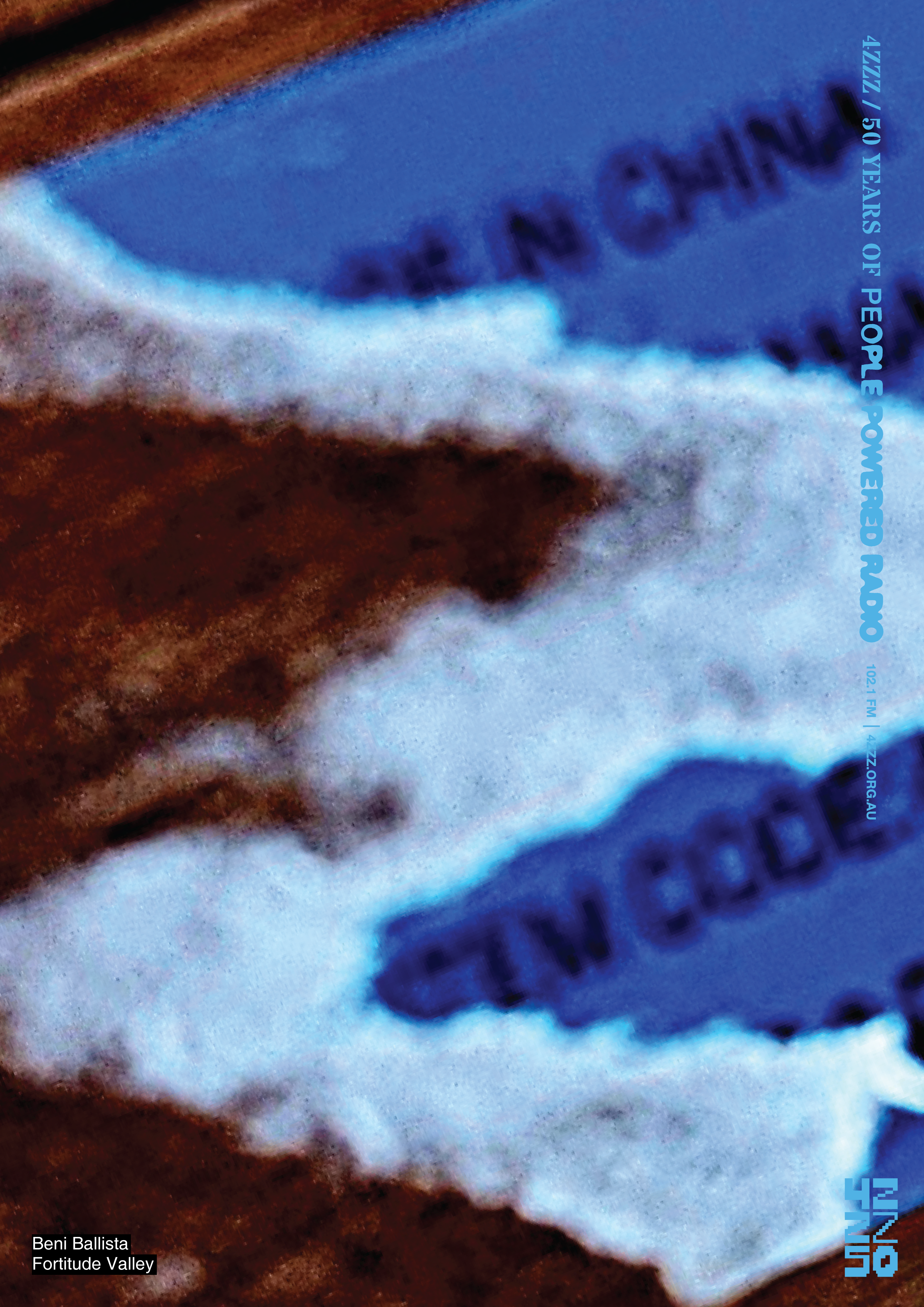 A brown, white and blue Z crafted from torn paper