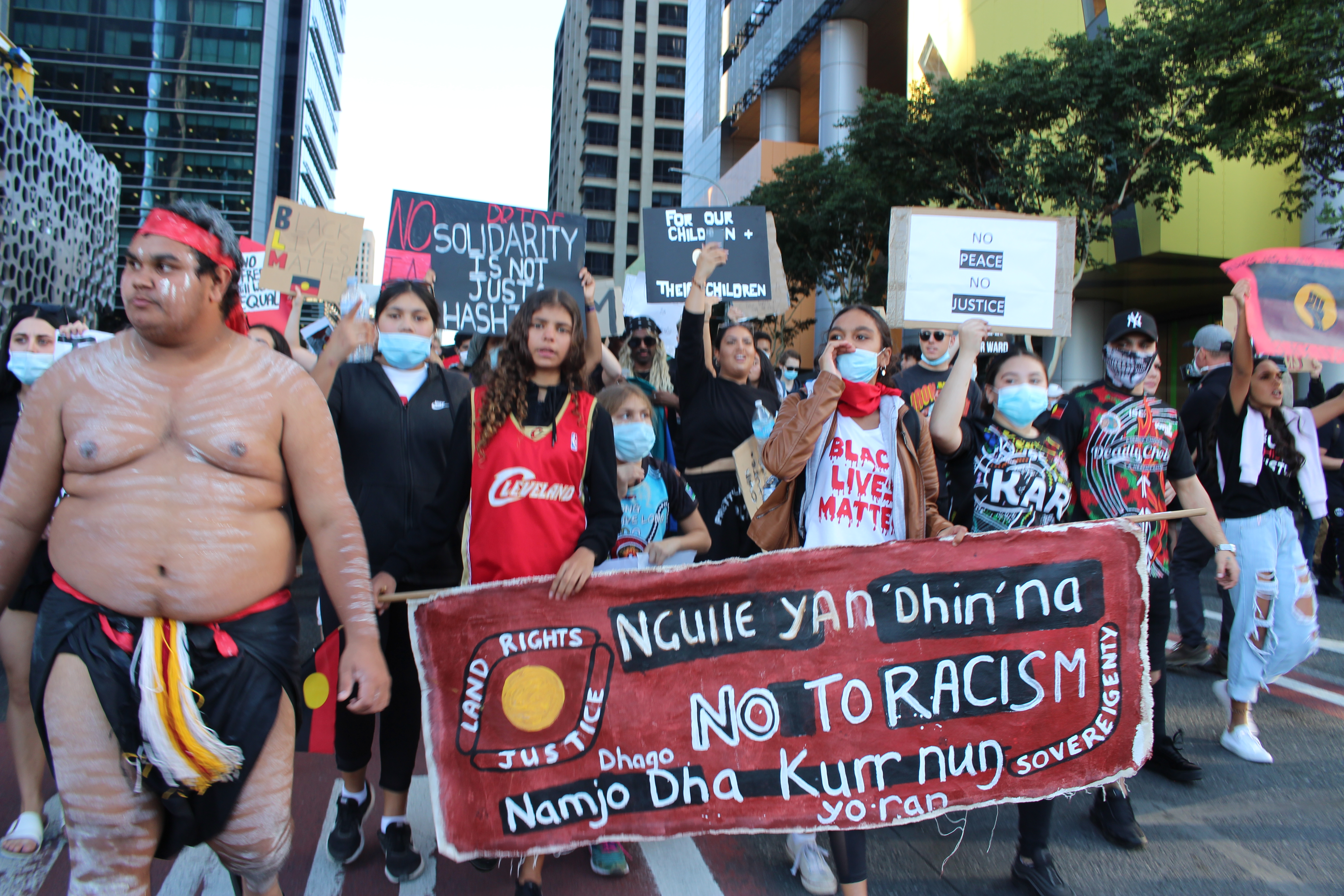 BLM Rally - Protesters with a Large Banner [4ZZZ/Lillian Rangiah]
