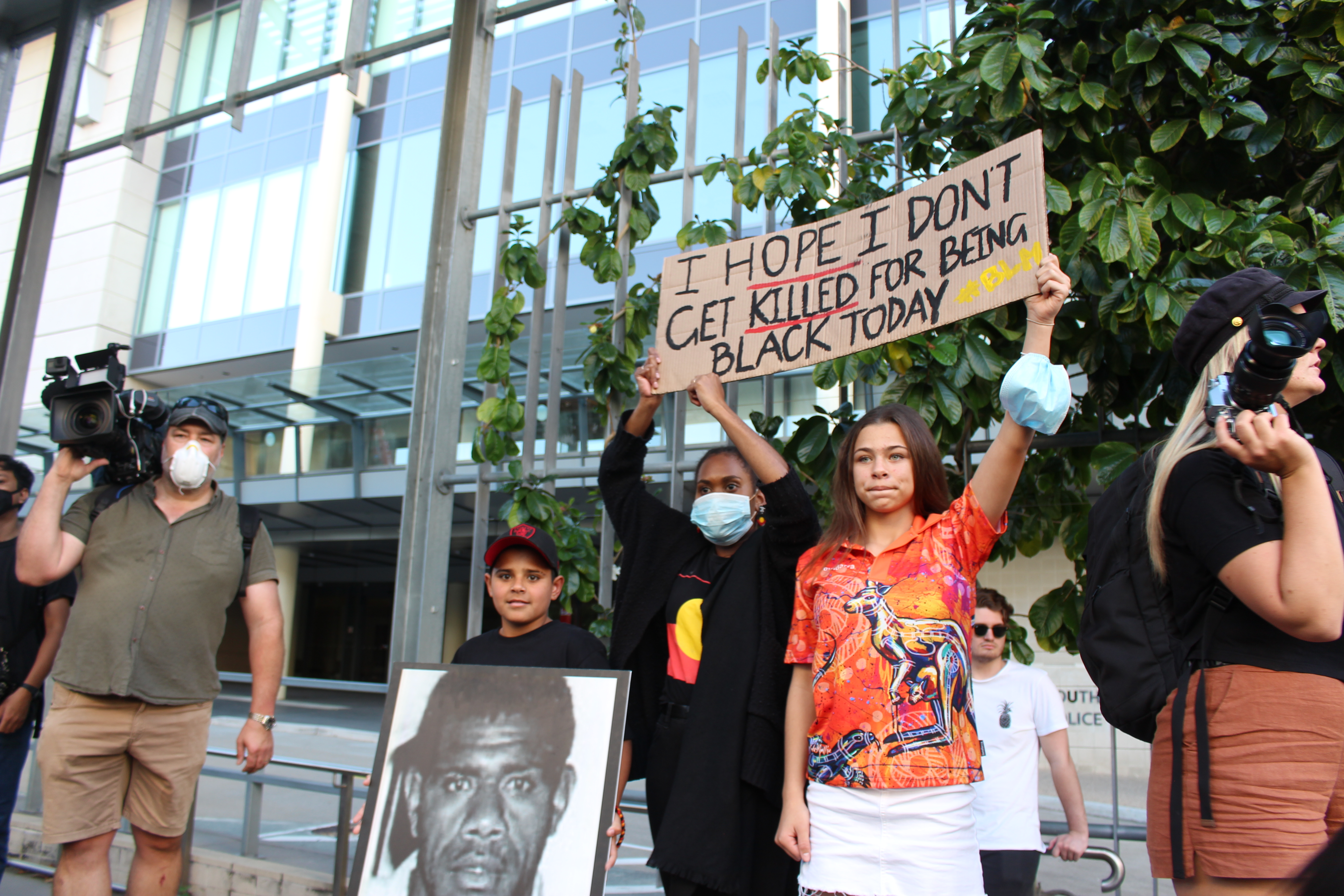 BLM Rally - Protesters with their Posters [4ZZZ/Lillian Rangiah]