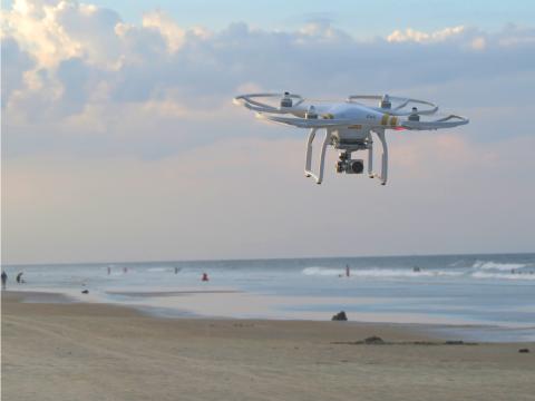 Drone flying over beach