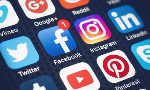 Image of phone homescreen displaying social media apps