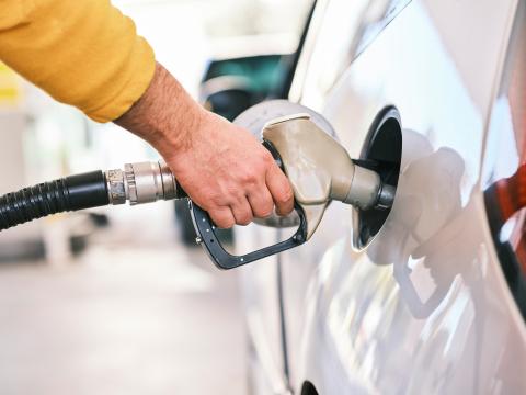 Image of man pumping petol 
