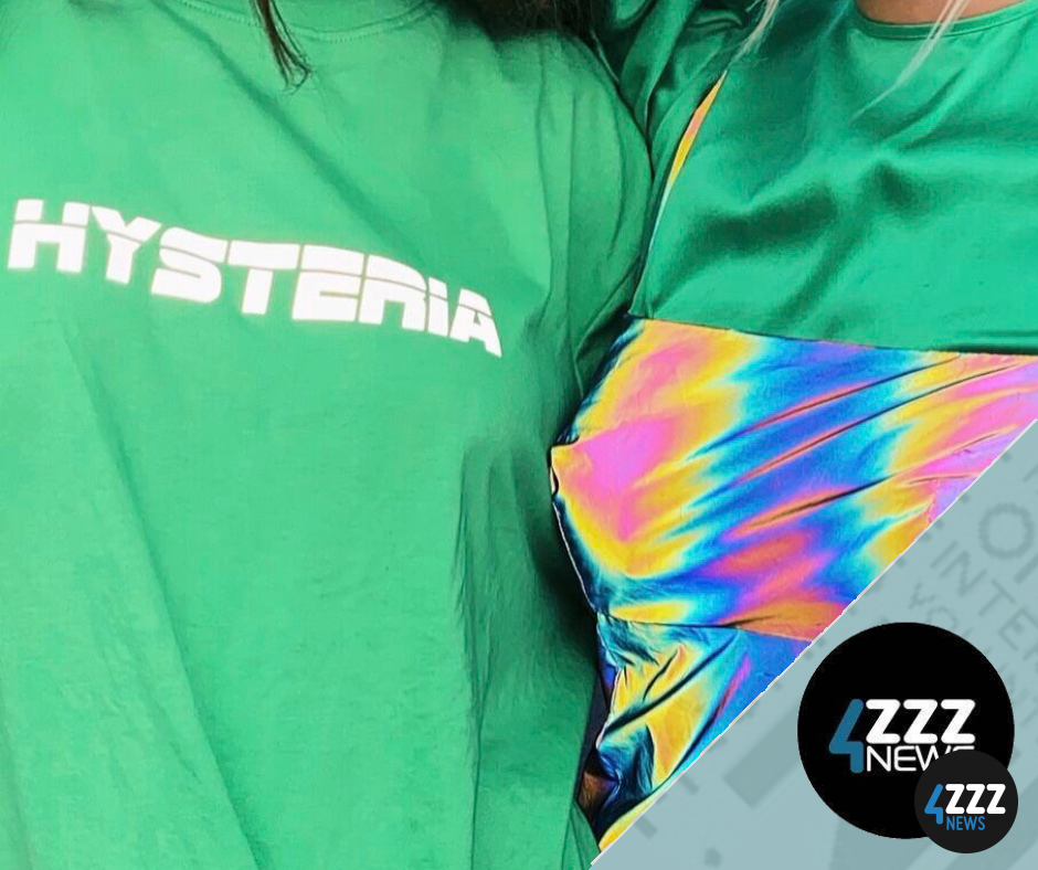 Green shirt and multicoloured dress with the "Hysteria" logo