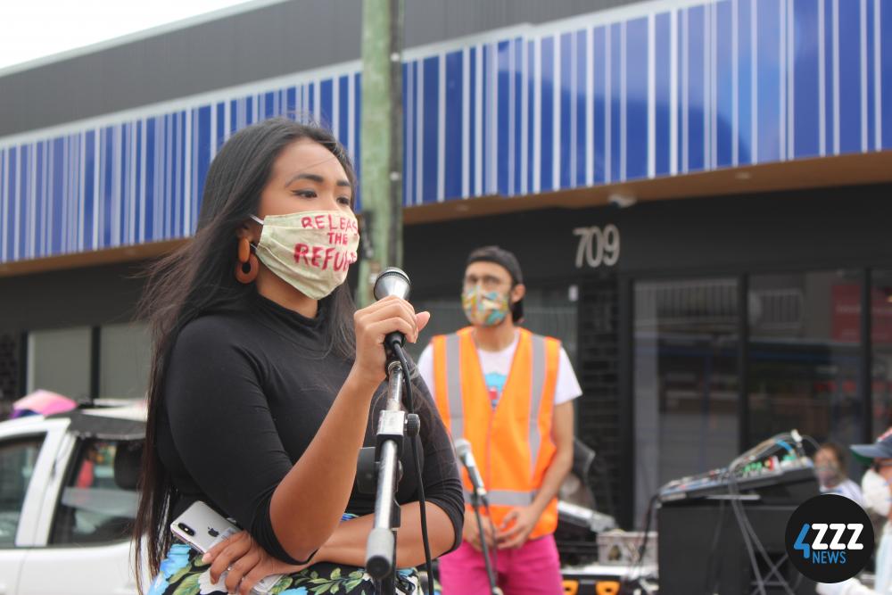 A speaker, quietly emotional during the 7 minutes silence. [4ZZZ/Lillian Rangiah]