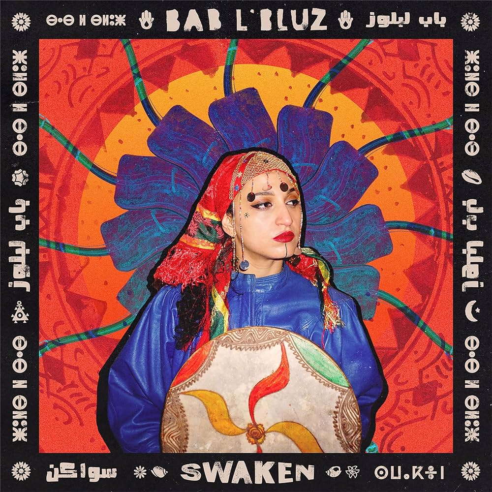 Bab L'Bluz by Swaken album cover - a person with an orb in the centre with a collage/graphic red, orange and blue background